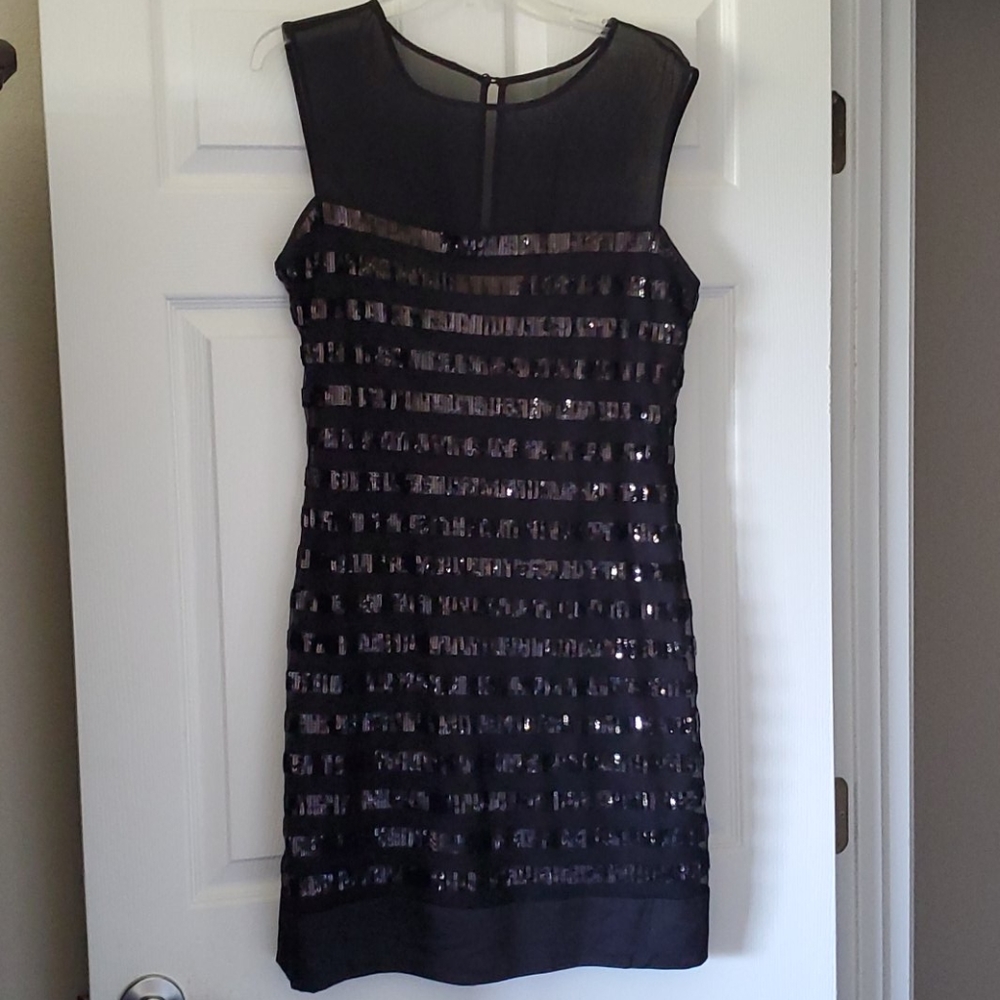 Black fitted dress with sequins
